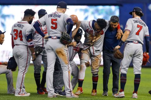 Braves’ Acuna carted off after awkward landing
