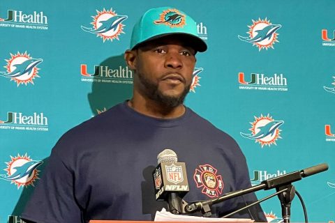 Dolphins fire Flores; Ross nixes Harbaugh talk