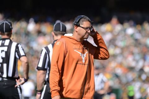Texas asst. coach sued over alleged monkey bite