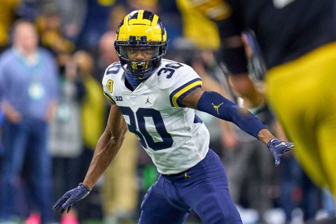 Michigan’s Hill not in Miami, iffy for CFP semifinal