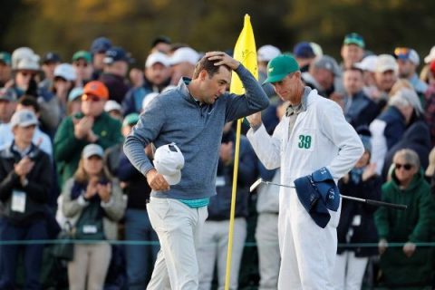 Scheffler fends off wind, cold to lead Masters by 3