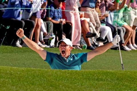 Rory vaults to 2nd at Masters with record-tying 64