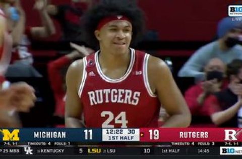Rutgers’ Ron Harper Jr. drains a contested three-pointer as the shot clock expires