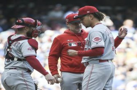 Grandal hits first lead-off HR, Brewers beat Reds 6-5