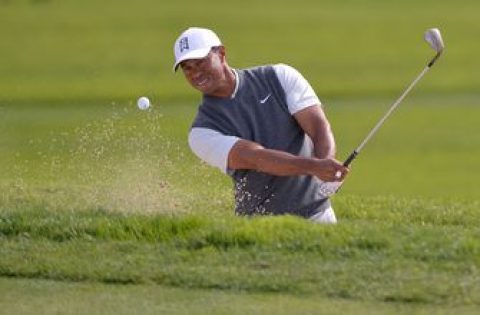 Farmers Insurance Open: Tiger Woods grinds out 70; Jon Rahm holds one-shot lead over Justin Rose