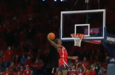 Arizona’s Bennedict Mathurin finishes the fast break in style with a windmill jam