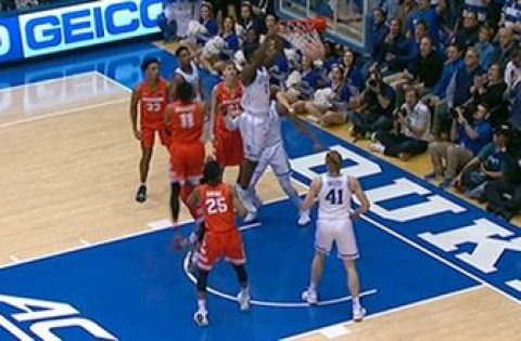 Zion Williamson follows his own miss with a two-handed slam